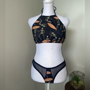 Moldie Goldies skeletons surfing bathing suit